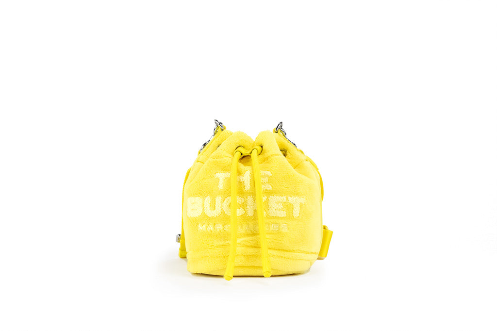 marc jacobs the terry mini bucket bag yellow on white background